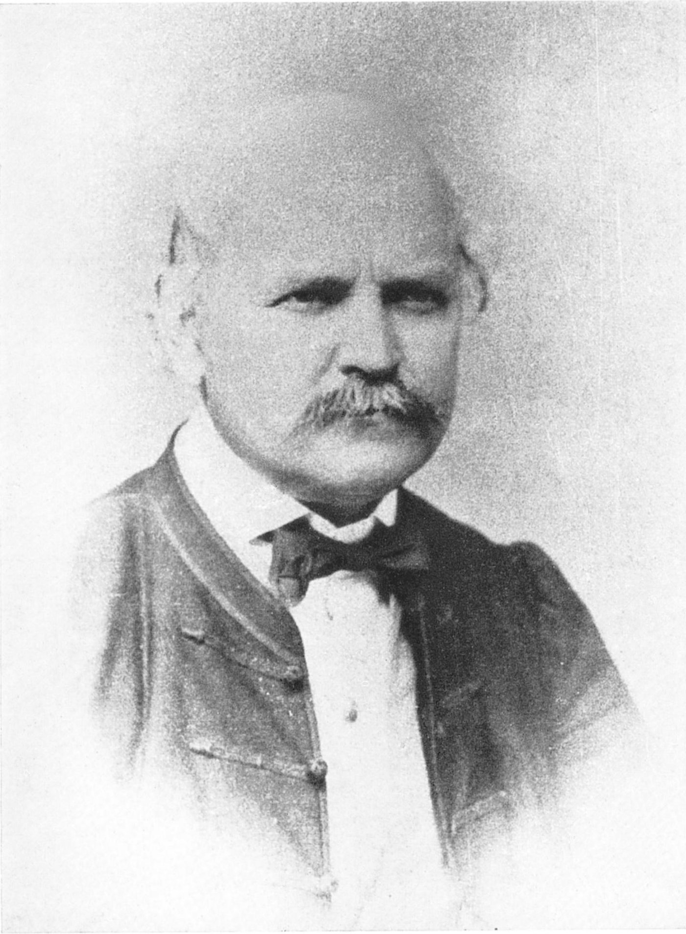 Fotografia em preto e branco de Ignaz Semmelweis, de bigode, gravata borboleta e paletó